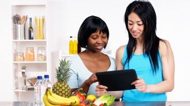 Nutritionist with patient and fruits and vegetables