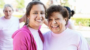 Mature woman and young woman smiling