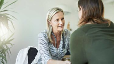 doctor talking to patient about gynaecological cancer